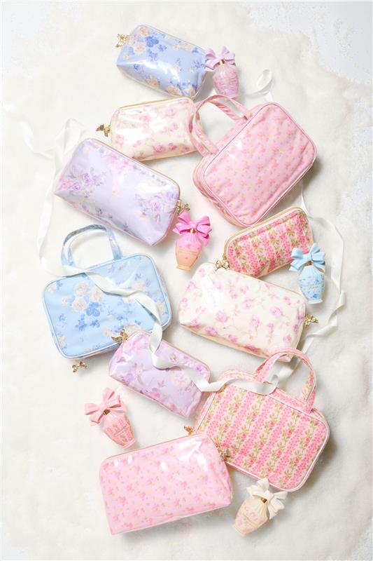 Women sitting in grass field wearing LoveShackFancy Slip Dresses