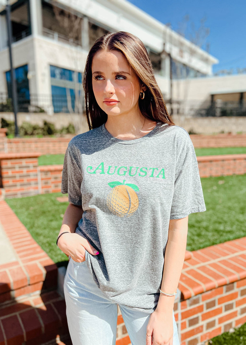 Model is wearing the Augusta, GA Golf Tee Shirt