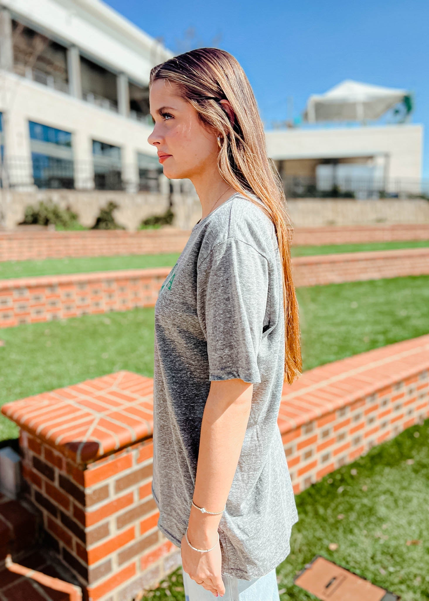 Model is wearing the Augusta, GA Golf Tee Shirt